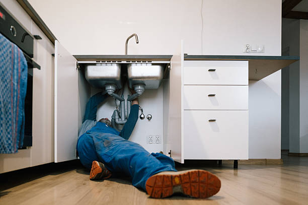 Professional Emergency Plumber technician working in Rigby, ID